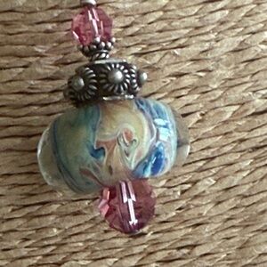 Artisan Glass blown glass with sterling silver intricate bead and pink crystal